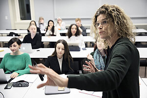 Classroom with teacher in front of students